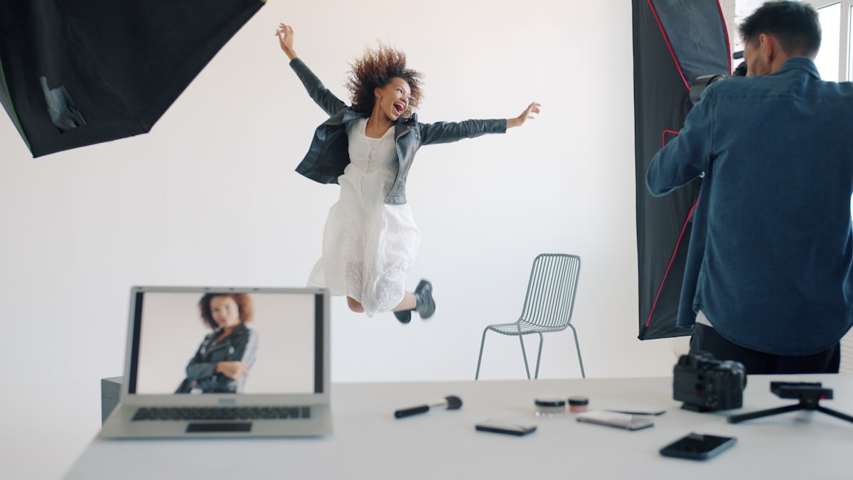 Model in dynamic studio photoshoot pose